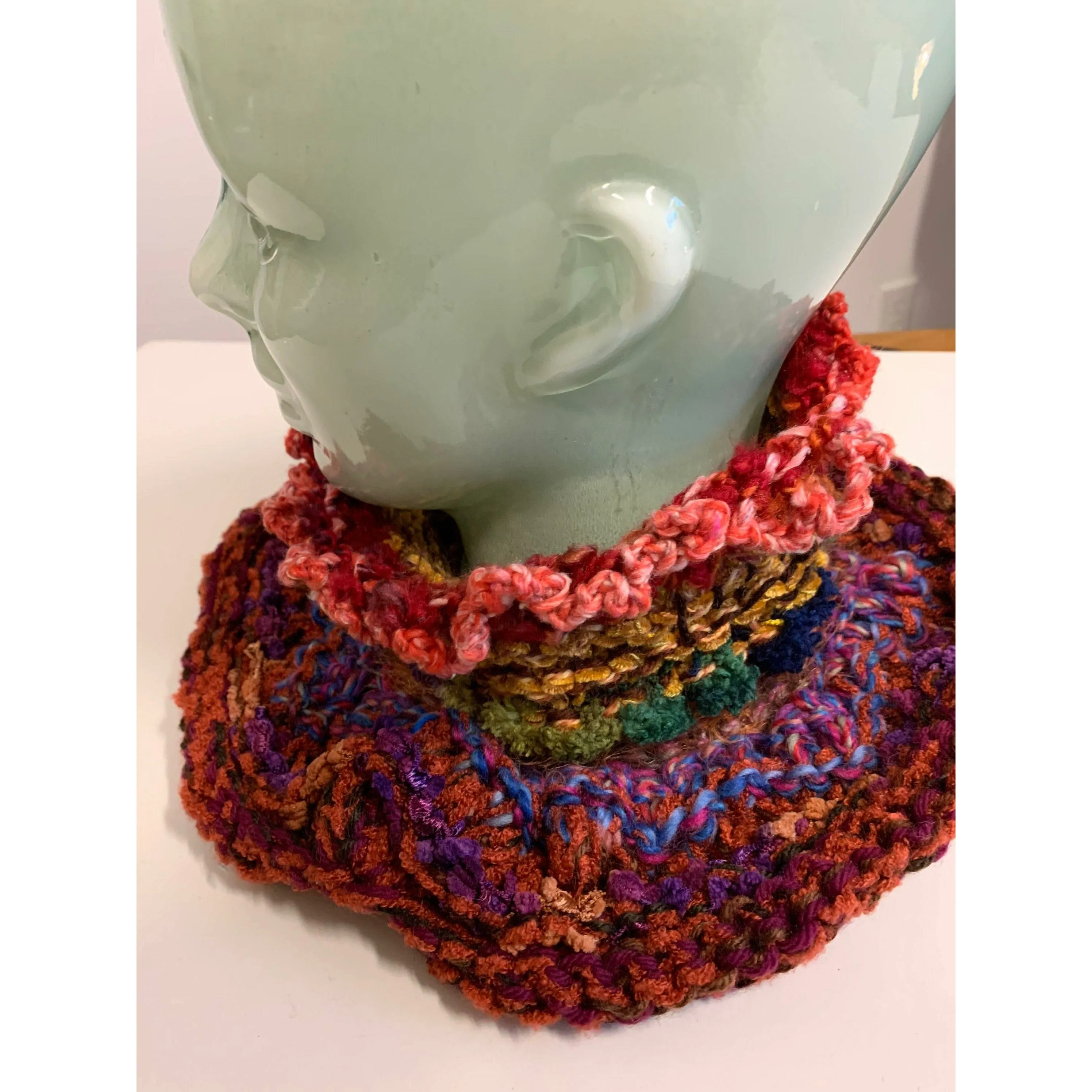 Hand knit in one piece soft infinity scarf adornment with multiple stitch and color textures. Winter scarf.