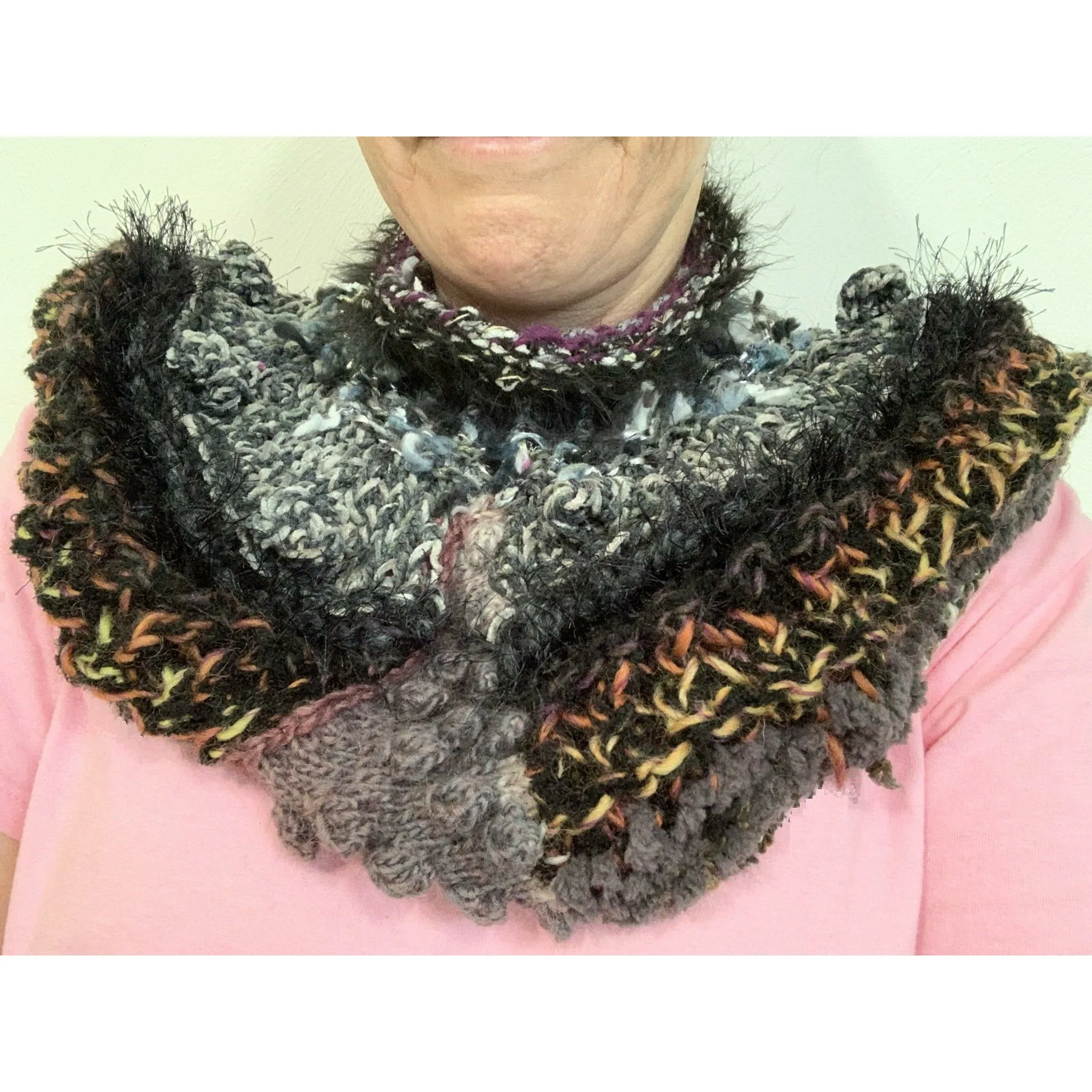 Handknit circular neck scarves in many colors and knit stitches to lend lots of textures and warmth