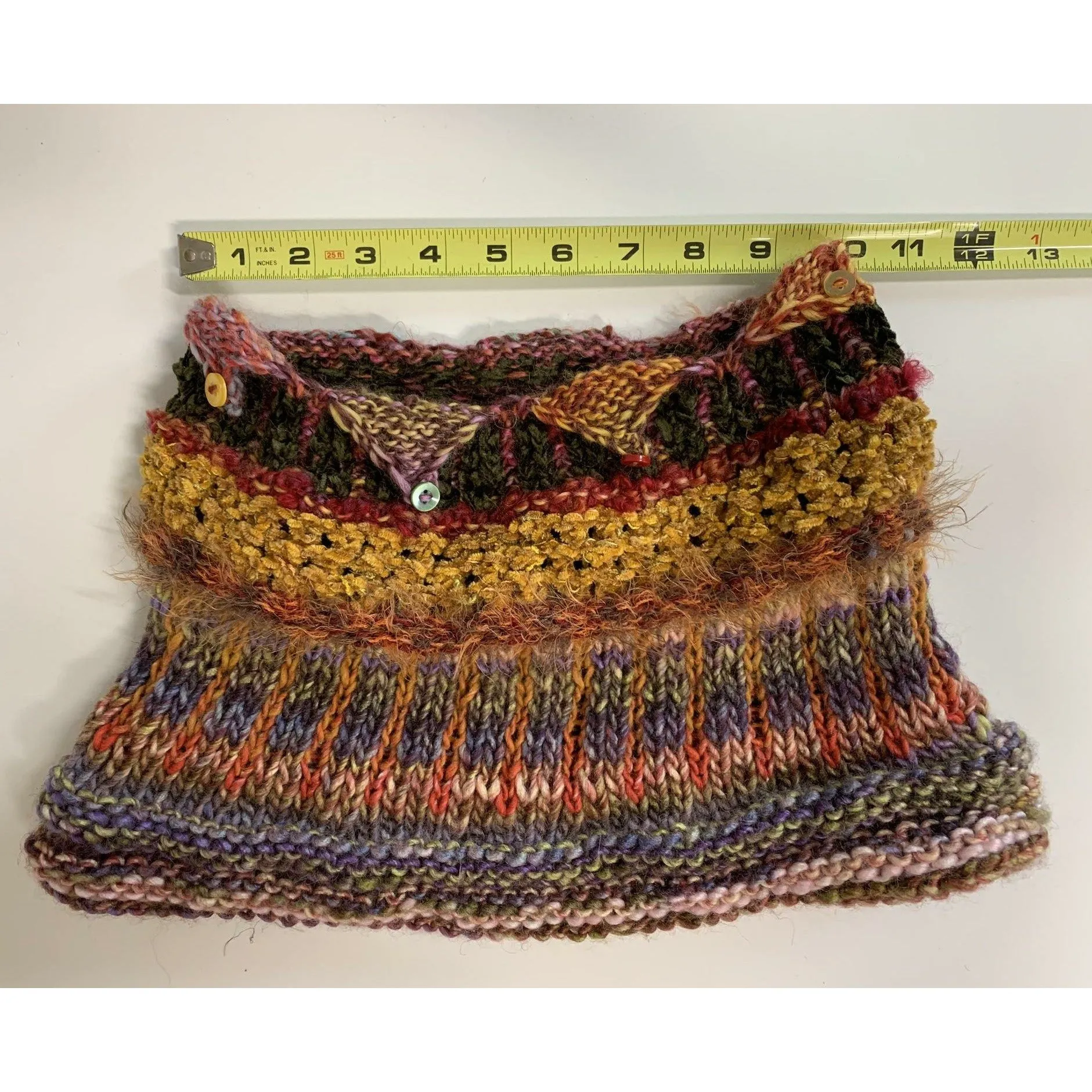 Handknit circular neck scarves in many colors and knit stitches to lend lots of textures and warmth