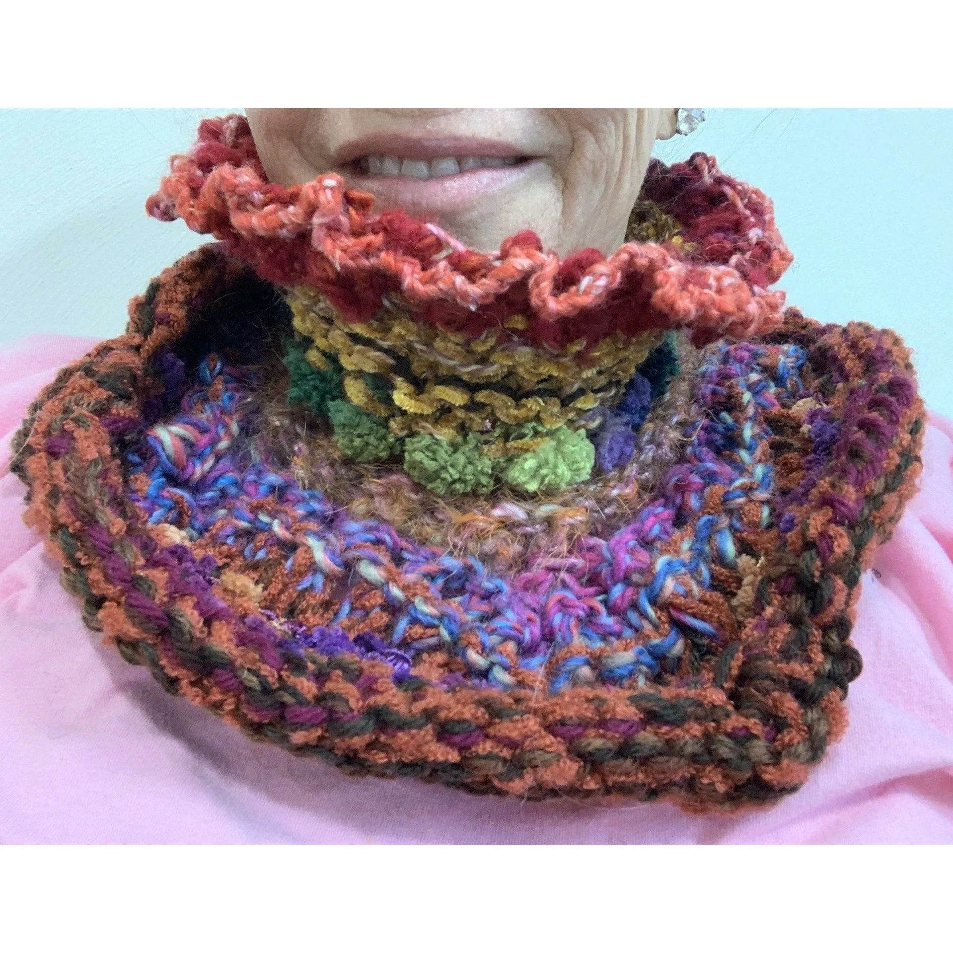 Handknit circular neck scarves in many colors and knit stitches to lend lots of textures and warmth